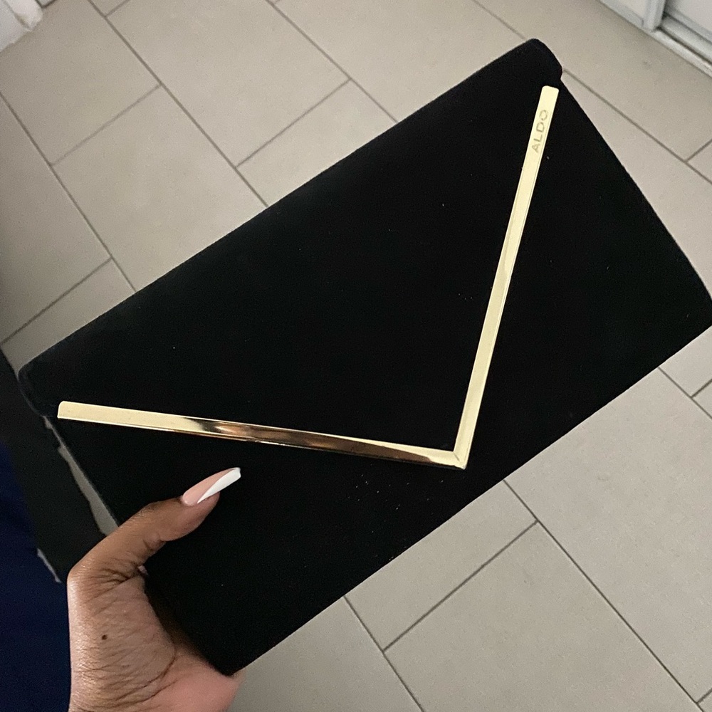 Aldo black and gold clutch